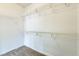 Walk-in closet with shelving and carpet flooring at 2605 Memphis Ave, Henderson, NV 89052
