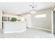 Bright dining area with stylish chandelier and access to the outdoors at 2605 Memphis Ave, Henderson, NV 89052