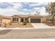 Attractive single-story home with desert landscaping and a welcoming entrance at 2605 Memphis Ave, Henderson, NV 89052