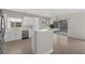 Open kitchen design featuring an island, stainless steel appliances, and access to the backyard at 2605 Memphis Ave, Henderson, NV 89052