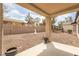 Covered patio area showcasing views of the private, desert-landscaped backyard at 2605 Memphis Ave, Henderson, NV 89052
