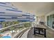 The balcony provides a peaceful retreat with comfortable seating and views of the pool and city architecture at 2747 Paradise Rd # 501, Las Vegas, NV 89109
