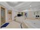 This bathroom features a double vanity, soaking tub, and separate toilet area at 2747 Paradise Rd # 501, Las Vegas, NV 89109