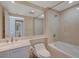 Well-appointed bathroom with a combination bathtub and shower, a sleek vanity, and a large mirror, providing a spa-like experience at 2747 Paradise Rd # 501, Las Vegas, NV 89109