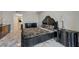 Serene bedroom featuring a dark wood bed, marble floors, and stylish furnishings, creating a luxurious and relaxing retreat at 2747 Paradise Rd # 501, Las Vegas, NV 89109