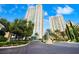 Beautiful building with tall towers, lush landscaping, and meticulously maintained paved driveways at 2747 Paradise Rd # 501, Las Vegas, NV 89109