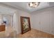 Elegant hallway with tile flooring and neutral walls, featuring a decorative painting near the entrance at 2747 Paradise Rd # 501, Las Vegas, NV 89109