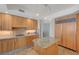Kitchen with stainless steel appliances, custom wood cabinets and granite countertops at 2747 Paradise Rd # 501, Las Vegas, NV 89109