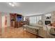 Bright living area boasts tile floors, modern decor, a fireplace, and a custom bar for seamless entertaining at 2747 Paradise Rd # 501, Las Vegas, NV 89109