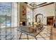 Spacious lobby with high ceilings, marble floors, a cozy seating area, and access to the pool at 2747 Paradise Rd # 501, Las Vegas, NV 89109