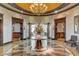 Elegant lobby with a large round table, marble floors, and decorative lighting, creating a welcoming atmosphere at 2747 Paradise Rd # 501, Las Vegas, NV 89109