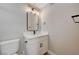 Bathroom featuring a vanity, sink, toilet, and modern lighting at 2839 Boise St, Las Vegas, NV 89121