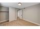 Bedroom featuring a closet with sliding doors, wood-look floors, light grey walls, and white trim at 2839 Boise St, Las Vegas, NV 89121