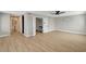 Open bedroom with wood flooring, ceiling fan, closet and bathroom access at 2839 Boise St, Las Vegas, NV 89121