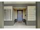 Close up of the home's front door and entryway with gray brick accents at 2839 Boise St, Las Vegas, NV 89121