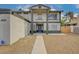 Inviting two-story home featuring a covered front entryway and desert landscaping at 2839 Boise St, Las Vegas, NV 89121