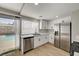 Bright kitchen featuring modern appliances and a sliding door leading to a backyard swimming pool at 2839 Boise St, Las Vegas, NV 89121