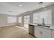 Open floor plan with renovated kitchen featuring modern appliances and countertops at 2839 Boise St, Las Vegas, NV 89121