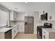 Updated kitchen features stainless steel appliances, modern cabinets, and countertops at 2839 Boise St, Las Vegas, NV 89121