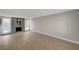 Spacious living room featuring a brick fireplace, and modern hardwood floors at 2839 Boise St, Las Vegas, NV 89121