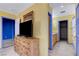 Bedroom featuring a view to the closet and bathroom with colorfully painted walls at 3193 Emerald Creek Dr, Las Vegas, NV 89156