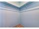 An organized walk-in closet with rod and shelf storage and neutral carpeting at 3193 Emerald Creek Dr, Las Vegas, NV 89156