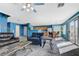 Bright living room features an open floor plan that seamlessly connects to the kitchen and dining area at 3193 Emerald Creek Dr, Las Vegas, NV 89156