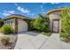 Beautiful home showcasing mature landscaping, a stone facade, and well-maintained grounds at 3518 W Agate Ave, Las Vegas, NV 89139