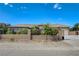 Charming single-story home with desert landscaping and a secure gated entrance at 3518 W Agate Ave, Las Vegas, NV 89139
