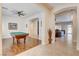 Spacious game room features a billiard table, ceiling fan, and hardwood flooring at 3518 W Agate Ave, Las Vegas, NV 89139