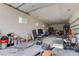 Spacious garage features ample storage, multiple windows, and a high ceiling at 3518 W Agate Ave, Las Vegas, NV 89139