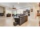 Living area featuring tiled flooring, a fireplace, and comfortable sofas at 3518 W Agate Ave, Las Vegas, NV 89139