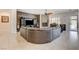 Open living area with tiled floors, a fireplace, and an inviting seating arrangement at 3518 W Agate Ave, Las Vegas, NV 89139