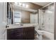 Bathroom featuring a shower and tub combo, vanity and tile flooring at 3800 Crema Ct, Las Vegas, NV 89129