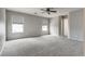 The bedroom is spacious with large windows at 3800 Crema Ct, Las Vegas, NV 89129