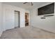 Bedroom with a large closet, TV and soft carpet at 3800 Crema Ct, Las Vegas, NV 89129