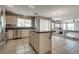 Modern kitchen with stainless steel appliances and a granite-topped island at 3800 Crema Ct, Las Vegas, NV 89129