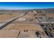 This aerial view shows the property situated near residential development and city amenities at 3900 W Landberg Ave, Las Vegas, NV 89141