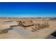 An aerial view showcases this private home's extensive lot with the city skyline in the distance at 3900 W Landberg Ave, Las Vegas, NV 89141