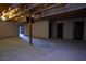Spacious unfinished basement with exposed ceiling and open floor plan at 3900 W Landberg Ave, Las Vegas, NV 89141