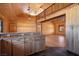 Open concept living space with wood floors and ceilings, plus granite countertops at 3900 W Landberg Ave, Las Vegas, NV 89141