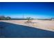 Expansive lot with desert landscaping, mountain views, and ample space for building at 3900 W Landberg Ave, Las Vegas, NV 89141