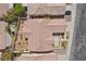 Aerial view of the property showcasing the roof, landscaping, and backyard layout within a fenced perimeter at 4416 Peaceful Morning Ln, Las Vegas, NV 89129
