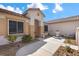 Inviting home featuring a decorative water fountain and walkway leading to the entrance at 4416 Peaceful Morning Ln, Las Vegas, NV 89129