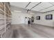 Spacious garage with storage racks and cabinets for organization at 4416 Peaceful Morning Ln, Las Vegas, NV 89129