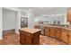 Well-appointed kitchen with stainless steel appliances, granite countertops, and center island for culinary convenience at 4416 Peaceful Morning Ln, Las Vegas, NV 89129