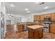 Bright kitchen with granite countertops, stainless steel appliances, and a practical kitchen island at 4416 Peaceful Morning Ln, Las Vegas, NV 89129