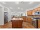 Spacious kitchen boasts granite counters, stainless appliances, and a functional kitchen island for meal prep at 4416 Peaceful Morning Ln, Las Vegas, NV 89129
