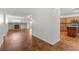 Spacious living area showcases tile flooring, fireplace, and open layout to kitchen for comfortable living at 4416 Peaceful Morning Ln, Las Vegas, NV 89129