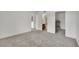 Bedroom with neutral carpeting, white walls, and multiple closets with white doors at 5170 S Jones Blvd # 205, Las Vegas, NV 89118